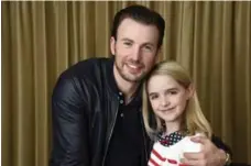  ?? CHRIS PIZZELLO/INVISION/THE ASSOCIATED PRESS ?? Chris Evans and Mckenna Grace, 10, play uncle and niece in Gifted.