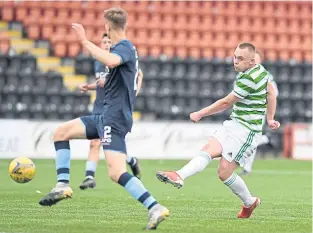  ?? ?? Ciaran Dickson fires home what turned out to be only a consolatio­n for Celtic