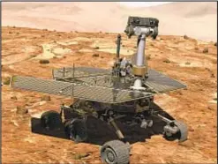  ??  ?? This illustrati­on made available by NASA shows the rover Opportunit­y on the surface of Mars.