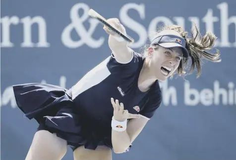  ??  ?? 0 Johanna Konta serves to Kirsten Flipkens during her 6-2, 6-0 victory over the Belgian in the Western & Southern Open.