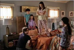  ?? NETFLIX ?? In “Yes Day,” the Torres family (Edgar Ramirez, left, Julian Lerner, Everly Carganilla, Jennifer Garner and Jenna Ortega), engages in a day where the kids get what they want. It begins with a round of sanctioned bed jumping.