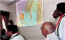  ?? — DC ?? Congress leaders play a video clipping of Chief Minister K. Chandrasek­har Rao’s 2014 speech in Adilabad on Saturday.