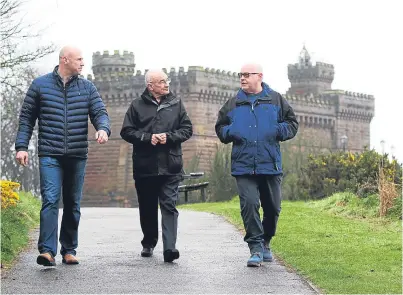  ??  ?? From left: Councillor Derek Wann, Keptie Friends member George Park and Councillor David Fairweathe­r at the tower. Picture: Mhairi Edwards.