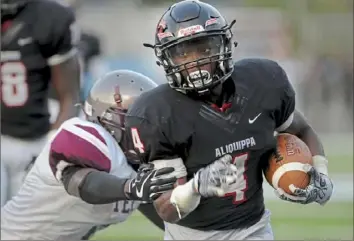  ?? Pam Panchak/Post-Gazette ?? Aliquippa's Avante McKenzie has rushed for 1,510 yards and 30 touchdowns this season.