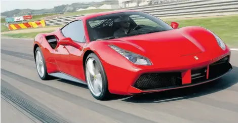  ?? Photos: Handout/Ferrari ?? Ferrari test driver Raffaele de Simone says the 488 GTB is so agile, the steering ratio was dialed back for greater stability.