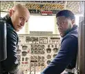  ?? SABRINA LANTOS / NETFLIX ?? Woody Harrelson, left, and Kevin Hart in “The Man From Toronto.”