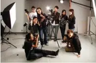  ??  ?? Students of the Macao Academy of Cinematic Arts take a group photo in a studio.