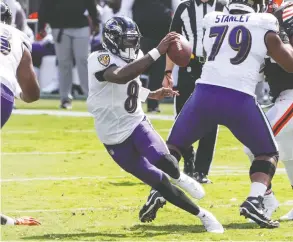  ?? TOMMY GILLIGAN / USA TODAY SPORTS ?? Baltimore Ravens quarterbac­k Lamar Jackson wasn't the first dual-threat quarterbac­k in the NFL, but might be the best at what one coach says getting you “out of a bad play.”