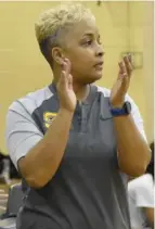  ?? Jason Cleveland, SDN file) (Photo by ?? Starkville High School girls basketball coach Kristie Williams applauds the play of her team during a game earlier this season.