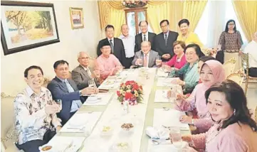  ??  ?? Uggah (fifth left) and wife Doreen (fifth right) with Julaihi (fourth left) and Sa’adiah (second right). Also seen are Jabu (third left), Empiang (fourth right), Dr Rundi (second left) and standing from left are Nanta, Rentap, Gerawat and Jamit.