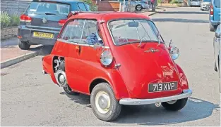  ?? ?? After a two year restoratio­n, the little three-wheeler looks fabulous. This is the 1961 Isetta 300’s first day on the road after Mike’s hard work.