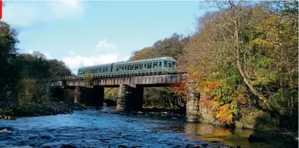  ?? ?? The Weardale Railway Trust-owned Class 108 crossing Wolsingham bridge en route for Bishop Auckland on October 30, 2019. JOHN ASKWITH, WEARDALE RAILWAY TRUST