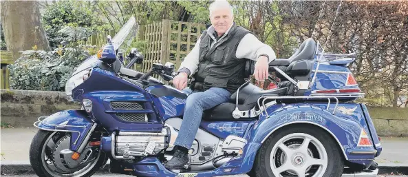  ??  ?? Barker, of Hunmanby, with his pride and joy – his Honda Goldwing trike