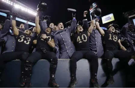  ??  ?? BRAGGING RIGHTS AGAIN: Army players celebrate their 17-10 win against Navy yesterday in Philadelph­ia. Army has won three straight in the rivalry.