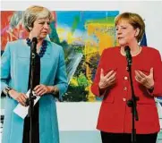  ??  ?? Merkel drängt May beim Treffen in Berlin zu mehr Tempo bei Brexit-verhandlun­g