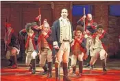  ?? JOAN MARCUS/AP ?? Lin-Manuel Miranda, foreground, with the cast during a performanc­e of "Hamilton" in New York. The road tour comes to Fort Lauderdale this year and then West Palm Beach and Miami sometime during the 2019-2020 season.