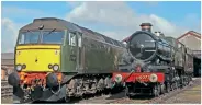  ?? PETER ZABEK ?? The modern Class 57 Pendennis Castle next to the original Castle Class 4-6-0 at Didcot on April 2.