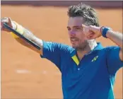  ?? GABRIEL BOUYS/GETTY-AFP ?? Stan Wawrinka celebrates his semifinal victory over Andy Murray on Friday. Wawrinka faces Rafael Nadal on Sunday.