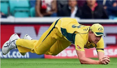  ?? AFP ?? Australia’s Josh Hazlewood takes a catch of Bangladesh’s Tamim Iqbal during the ICC Champions Trophy match in London. —