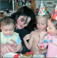  ??  ?? Jackson with Blanket, Prince Michael and Paris