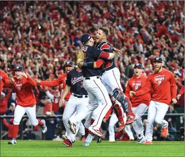  ??  ?? Washington Post file photo The National League champion Washington Nationals hope to follow in the footsteps of the Boston Red Sox, who didn’t have as much rest as the Los Angeles Dodgers but still won the World Series in five games.