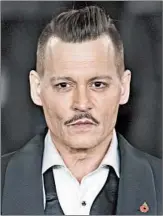  ?? VIANNEY LE CAER/AP ?? A man allegedly punched by Johnny Depp, above, says he was fired when he refused to promise not to sue.