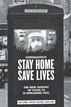  ?? TOLGA AKMEN/AFP VIA GETTY IMAGES ?? A digital display at a bus station warns of the new strain of coronaviru­s in central London on Friday as England entered a third lockdown.