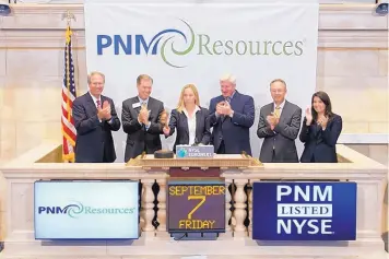  ?? COURTESY OF NYSE/EURONEXT ?? Pat Collawn rings the closing bell at the New York Stock Exchange on Sept. 7, 2012. PNM was celebratin­g 40 years of being listed on the exchange.