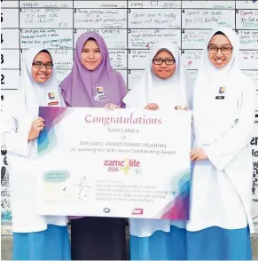  ??  ?? Football has the power to unite, an undeniable fact which led (from left) Nur Dini Dayana, Wan Nur ‘Alya, Wan Nur Fatini and Syarifah Yasmin to come up with their inspiring PSA.