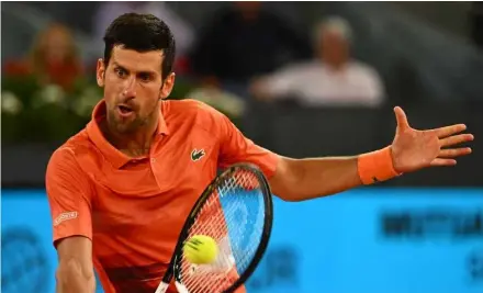  ?? AFP/VNA Photo ?? NO WAY BACK: Novak Djokovic on his way to an 18th straight win over Gael Monfils.