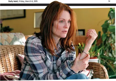  ??  ?? Haunting performanc­e: Julianne Moore at the start of her quiet descent into Alzheimer’s in Still Alice