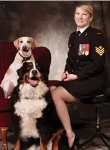  ?? CPL. KEN BELIWICZ ?? Retired Canadian naval officer Isabelle Allard with Thor, top left, the dog she adopted while deployed to Kandahar in 2010, and Maddy. Left, Allard and Thor on base. Allard says strays acted as ad hoc therapy animals. “It’s easier to go see the dog who...