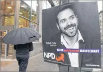  ?? CP PHOTO ?? A campaign poster of Quebec NDP leader Raphael Fortin is seen in Montreal Tuesday.