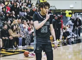  ?? Craig Weston For The Times ?? MARCUS ADAMS JR., Narbonne’s 6-foot-8 senior standout, quieted San Pedro fans with a 40-point night last week. He’s averaging 30 points and 10 rebounds.