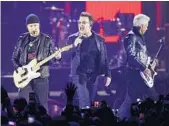  ?? AP FILE ?? The Edge, Bono and Adam Clayton of U2, who will perform June 11 at Hard Rock Stadium in Miami Gardens.