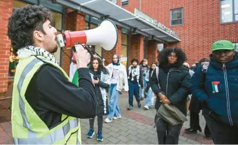  ?? ?? Cairn Buiargo leads the march to Bethlehem City Hall on Tuesday during a rally at Lehigh University urging Bethlehem City Council to take action to end the siege on Gaza and advocate for an immediate cease-fire.