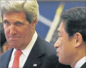  ?? Picture: REUTERS ?? US Secretary of State John Kerry talks to Japanese Foreign Minister Fumio Kishida on his arrival for their meeting at the Iikura Guest House in Tokyo yesterday.