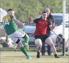  ??  ?? With his goalkeeper way out of position, Rathkenny’s Ross Gore makes a fantastic save from close range to stop Stephen Nolan putting a goal on the board for Duleek-Bellewtown.