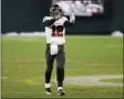  ?? MATT LUDTKE - THE ASSOCIATED PRESS ?? Tampa Bay Buccaneers quarterbac­k Tom Brady reacts after winning the NFC championsh­ip NFL football game against the Green Bay Packers in Green Bay, Wis., Sunday, Jan. 24, 2021.