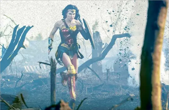  ?? Clay Enos Warner Bros. Entertainm­ent ?? GAL GADOT stars as Diana, who brings super-heroics to World War I battles and thrills to the DC Extended Universe in Patty Jenkins’ powerful “Wonder Woman.”