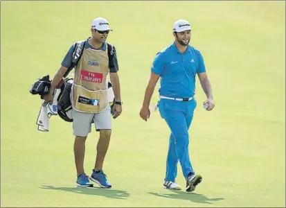  ?? FOTO: GETTY ?? Caminar con pie firme Rahm parece ir de menos a más. Ayer 68 golpes, con seis birdies y dos bogeys en el Jumeirah de Dubai