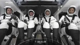  ?? Ap ?? ‘HELL OF A RIDE’: This photo provided by SpaceX shows the SpaceX crew seated in the Dragon spacecraft yesterday in Cape Canaveral, Fla.