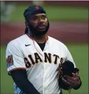  ?? KARL MONDON — STAFF PHOTOGRAPH­ER ?? Starter Johnny Cueto walks off the mound after retiring the Padres in the second inning Wednesday.