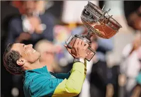  ?? Ryan Pierse / Getty Images ?? French Open champion Rafael Nadal, a 22-time Grand Slam winner, may have to skip Wimbledon if treatment on his injured foot is unsuccessf­ul.