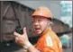  ?? PROVIDED TO CHINA DAILY ?? Dock worker Pi Jinjun directs his team at the Port of Qingdao in Shandong province in July.