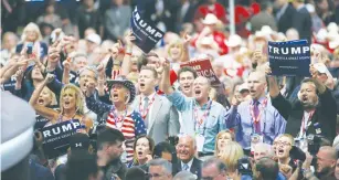  ?? (Mario Anzuoni/Reuters) ?? DELEGATES AT the Republican National Convention in Cleveland cheer yesterday during New Jersey Gov. Chris Christie’s speech.