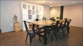  ?? Michael Hornick ?? The dining area of the condominiu­m at 2250 Mary St., South Side, is tucked under the loft-style bedroom.