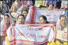  ?? PTI ?? People protest against the amended citizenshi­p act in Jorhat, Assam, on Sunday.