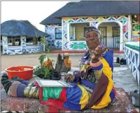  ??  ?? THE PERFECT LINE: Mahlangu at work, seated on her blanket