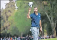  ?? "1 1)050 ?? Dustin Johnson celebrates winning the Mexico Championsh­ip at Chapultepe­c Golf Club in Mexico City on Sunday.